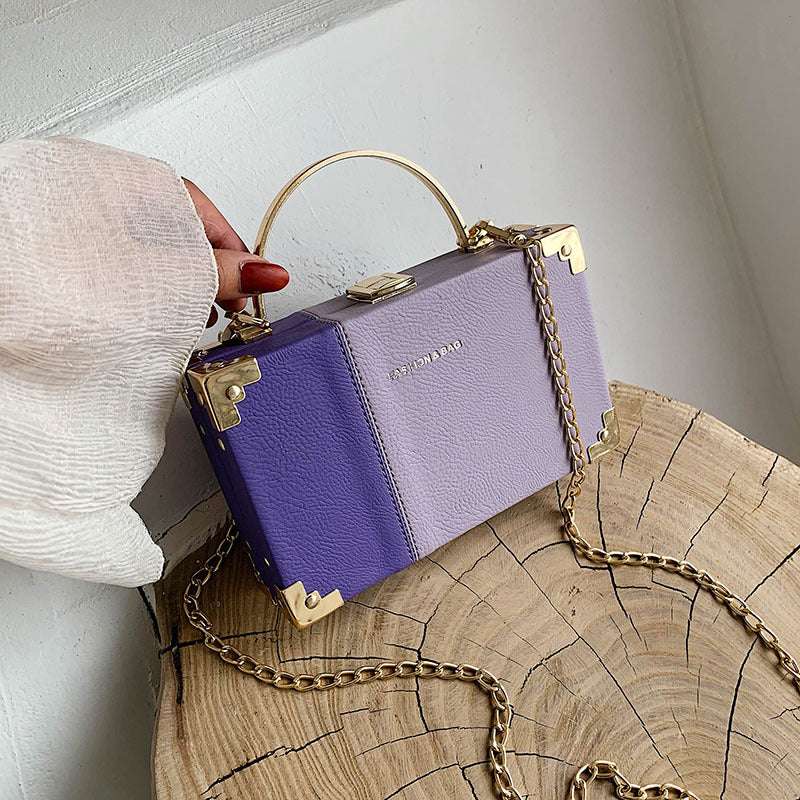 The Serpentine Clutch: RAMODO Evening Bag - Purple