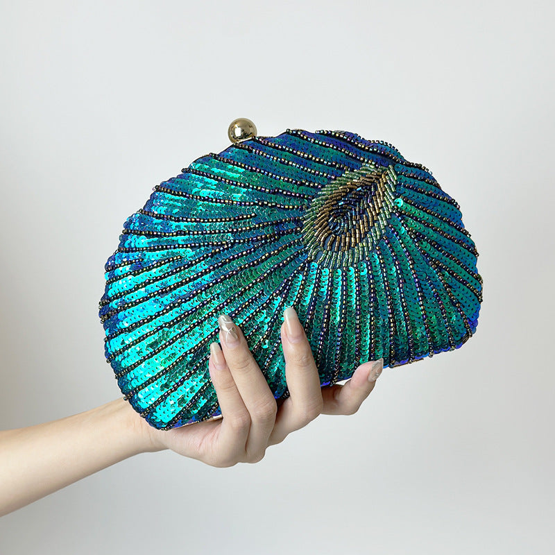 RAMODO Peacock Shell - Beaded Clutch Inspired by Nature