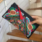 The Artisan's Bloom: Hand-Embroidered Purse