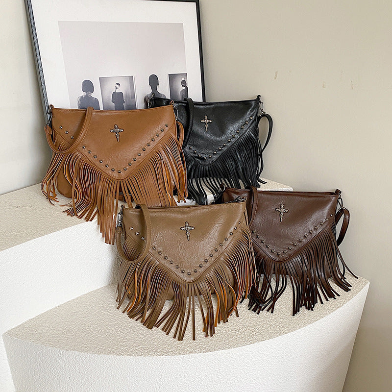 The Rivet Rebel - Trendy Crossbody Bag with Tassel Accent