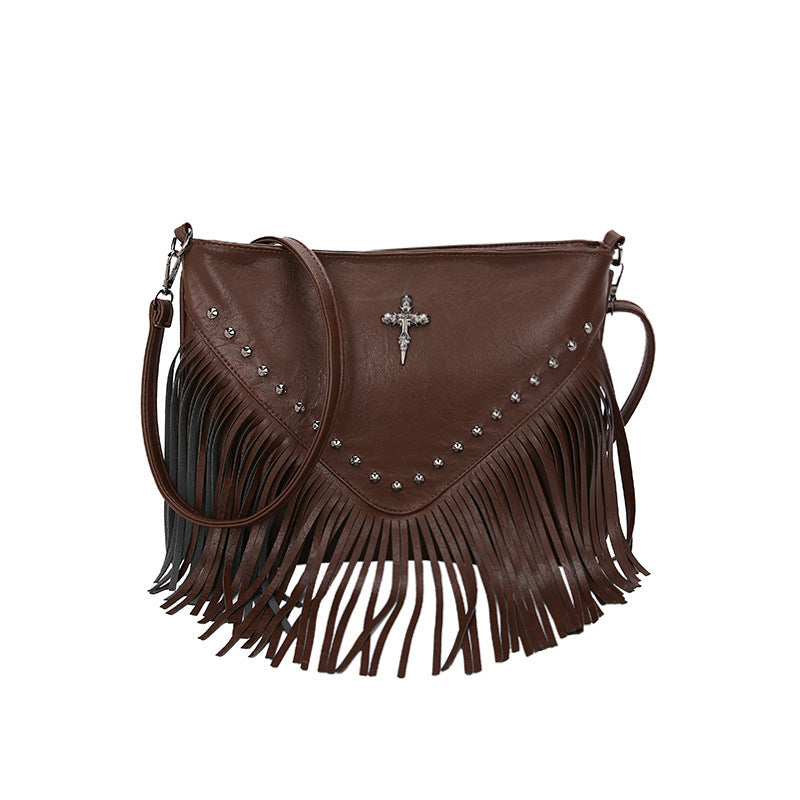 The Rivet Rebel - Trendy Crossbody Bag with Tassel Accent