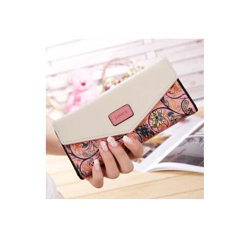 Le portefeuille Blooming Bloom - Pochette en cuir PU à motif floral avec fermeture à glissière