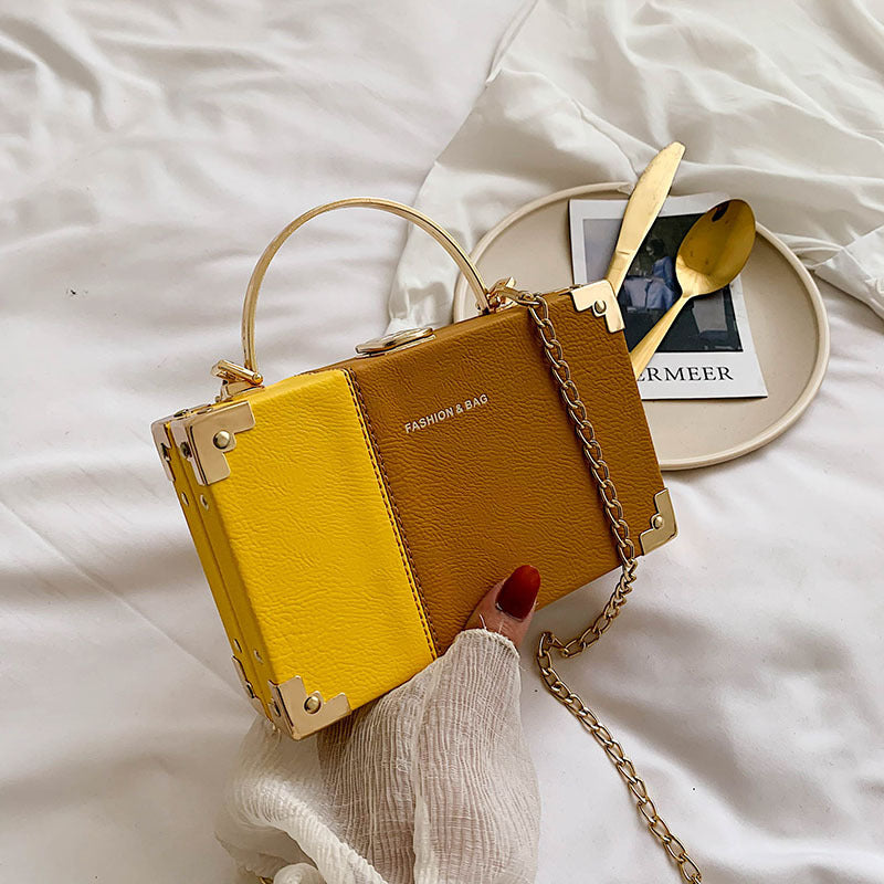 The Serpentine Clutch: RAMODO Evening Bag - Yellow