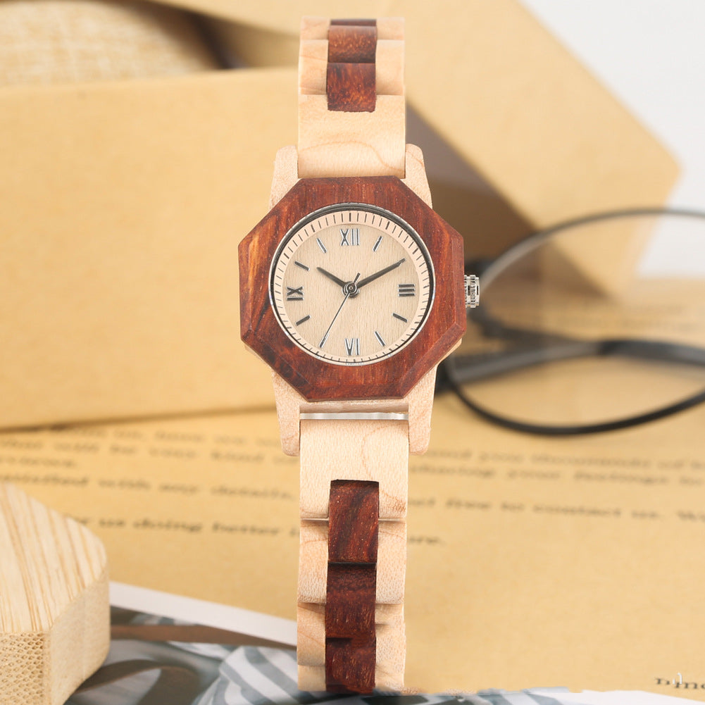Wooden watch with a hexagonal face on a yellow background