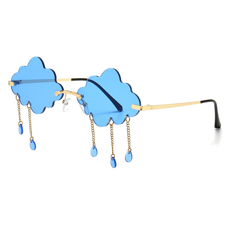 Blue cloud-shaped sunglasses with chain details on a white background