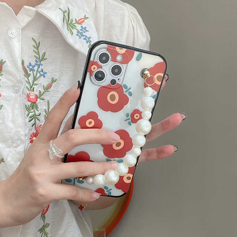Korean Floral Pearl Strap iPhone Case - Protective & Stylish Wristlet Cover