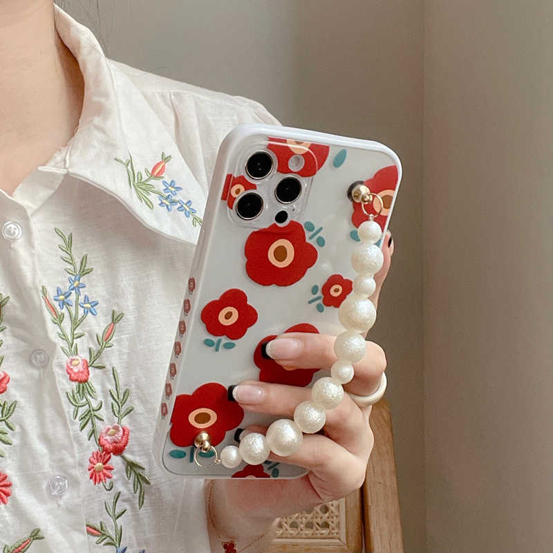 Korean Floral Pearl Strap iPhone Case - Protective & Stylish Wristlet Cover