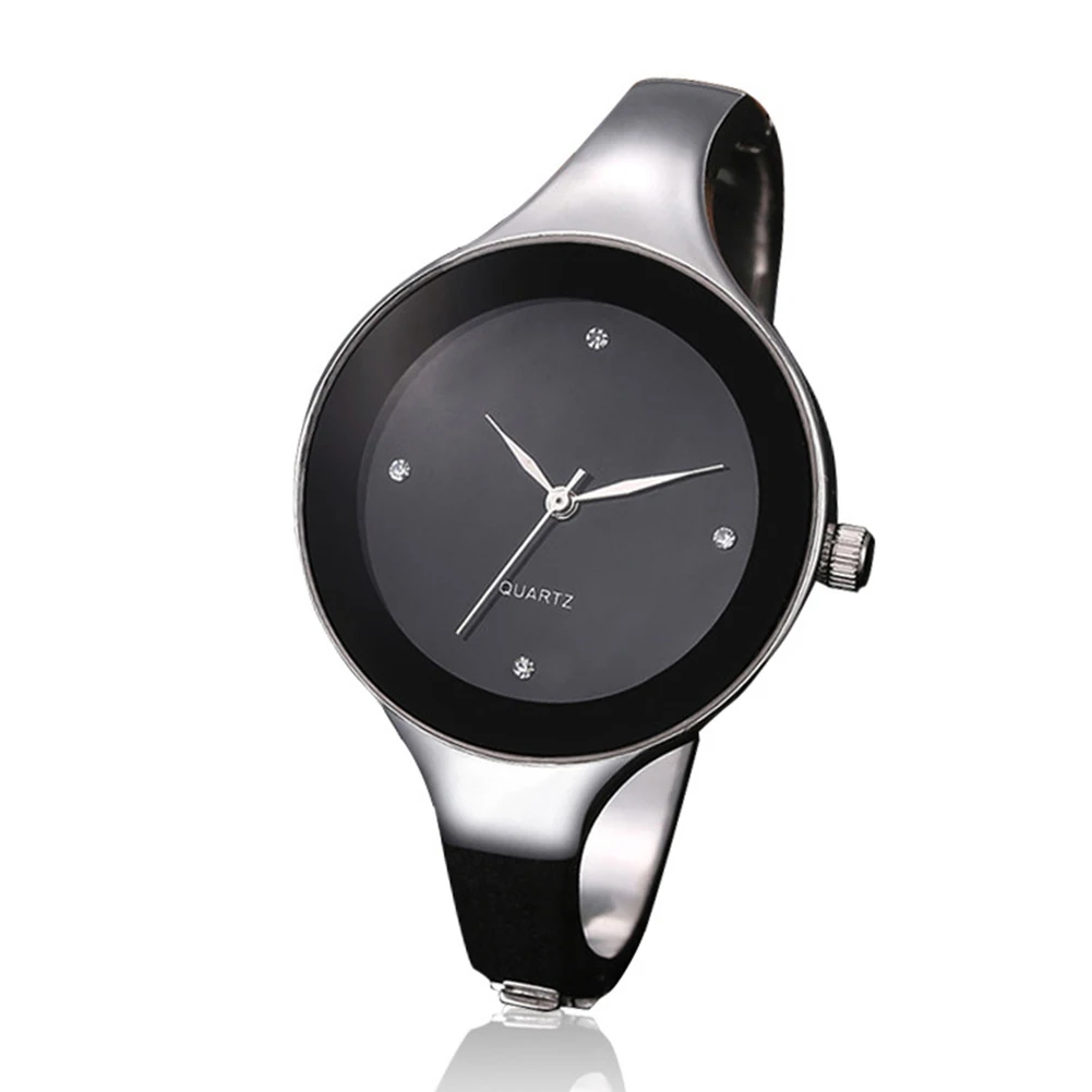 Silver watch with black face on a white background