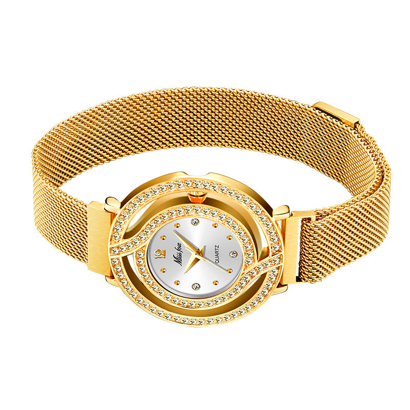 Gold watch with mesh band on a white background
