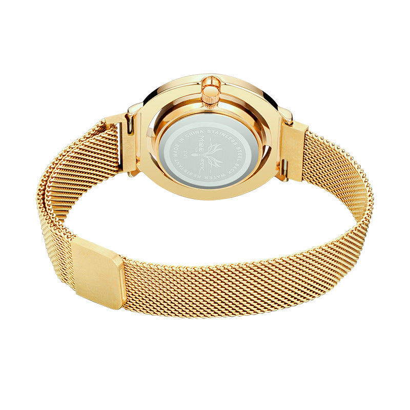 Gold watch with mesh band on a white background
