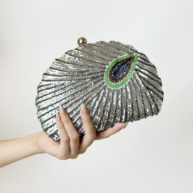 RAMODO Peacock Shell - Beaded Clutch Inspired by Nature