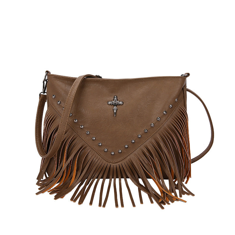 The Rivet Rebel - Trendy Crossbody Bag with Tassel Accent