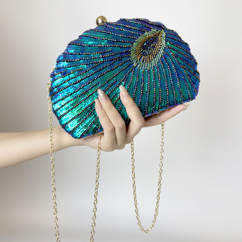 RAMODO Peacock Shell - Beaded Clutch Inspired by Nature