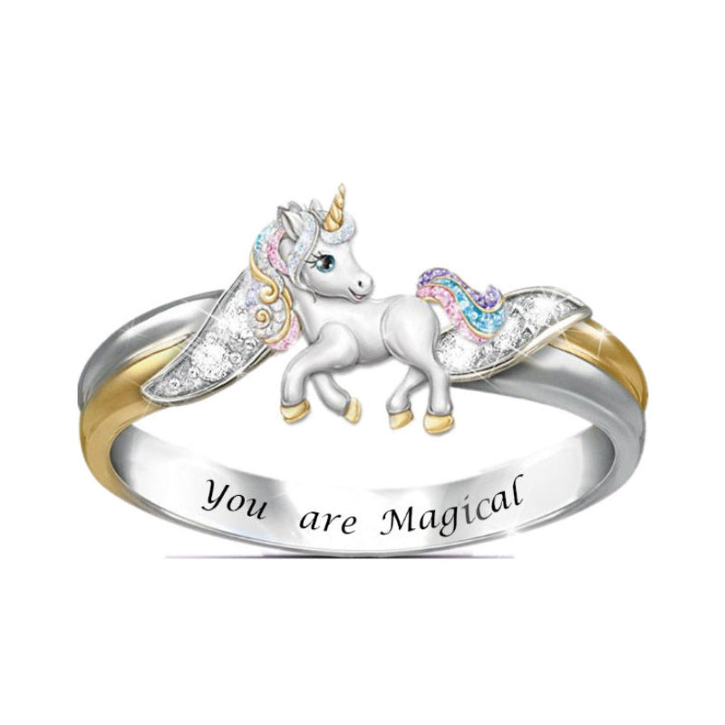 Unicorn-themed ring with 'You are Magical' engraving on a white background