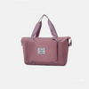 Pink tote bag on a light gray 