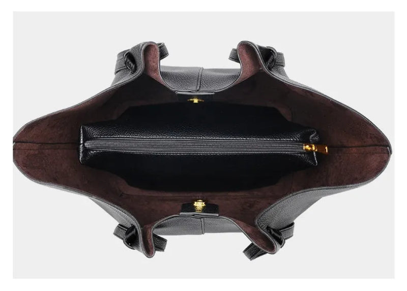 Top-down view of a dark brown leather handbag showing its interior, featuring a thick, zippered black lining with gold-tone hardware. The image is presented on a light gray background with descriptive text at the bottom.
